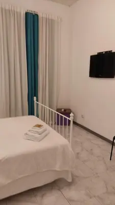 Letto o letti in una camera di Vicolo Stretto