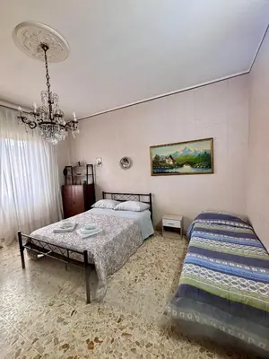 Letto o letti in una camera di Appartamento turistico Giarre