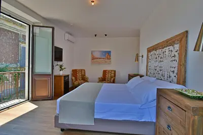 Letto o letti in una camera di San Anton Hotel