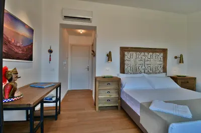 Letto o letti in una camera di San Anton Hotel