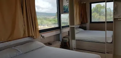 Letto o letti in una camera di Suite Panorama - attico esclusivo con vista Etna e Ionio
