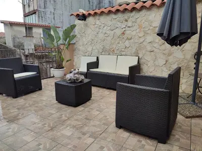 Area soggiorno di Appartamento Aci Sant'Antonio