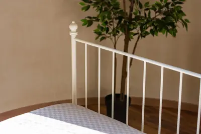 Letto o letti in una camera di Locanda Popolare