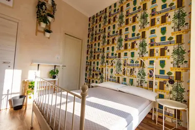 Letto o letti in una camera di Locanda Popolare