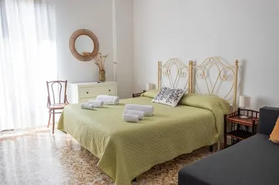 Letto o letti in una camera di Fermata Cappuccini