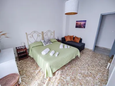 Letto o letti in una camera di Fermata Cappuccini