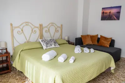 Letto o letti in una camera di Fermata Cappuccini