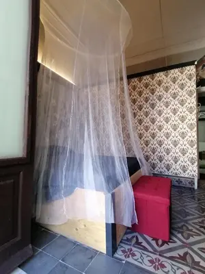 Letto o letti in una camera di L'Antico Palazzo rooms