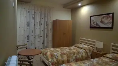 Letto o letti in una camera di B&B Patty's House