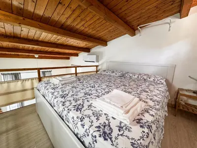 Letto o letti in una camera di Cami s holidays home mare
