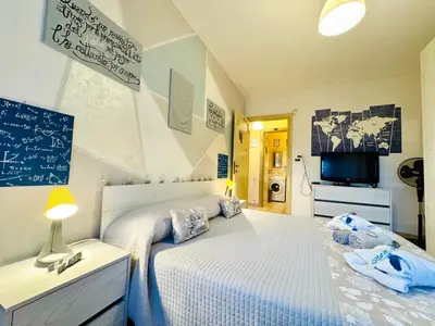 Letto o letti in una camera di Casa Esemes
