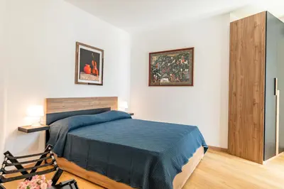 Letto o letti in una camera di Aurora Rooms