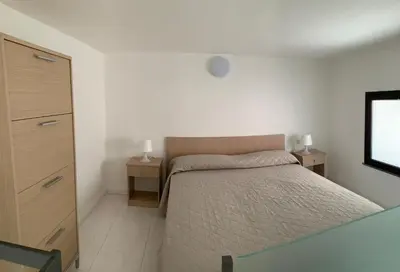 Letto o letti in una camera di Woodenloft16