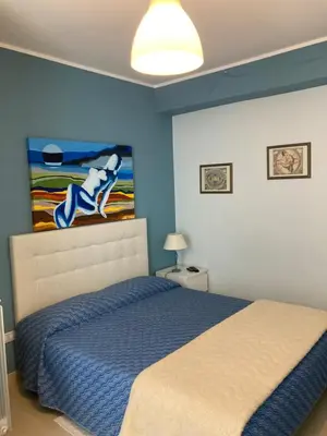 Letto o letti in una camera di Stanza Luna