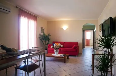 TV o dispositivi per l'intrattenimento presso Motta Residence Hotel