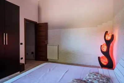 Letto o letti in una camera di Sicilian Sunrise Host