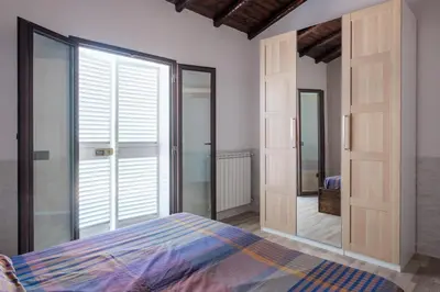 Letto o letti in una camera di Sicilian Sunrise Host