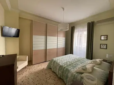 Letto o letti in una camera di Tra il nero e il blu - appartamento