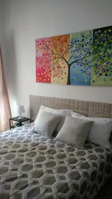 Letto o letti in una camera di Appartamento Gemma 1