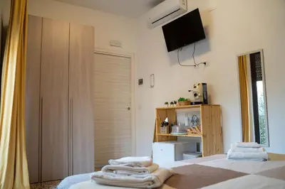 Letto o letti in una camera di L'angolo di Acitrezza