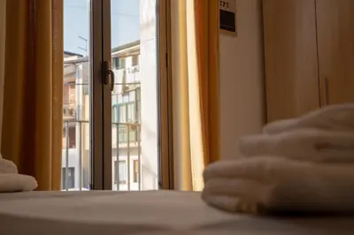 Letto o letti in una camera di L'angolo di Acitrezza