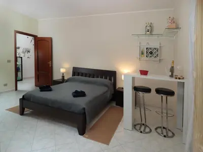 Letto o letti in una camera di Apt Villa for families