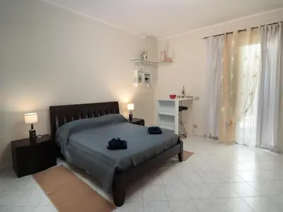 Letto o letti in una camera di Apt Villa for families