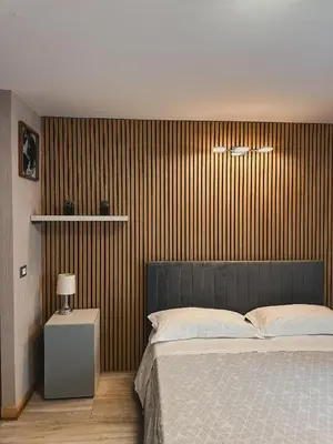 Letto o letti in una camera di Bosco Rooms - Via Napoli - Ground Floor