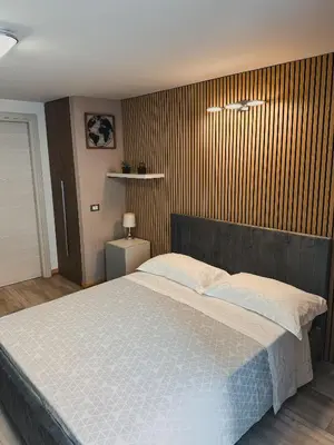Letto o letti in una camera di Bosco Rooms - Via Napoli - Ground Floor