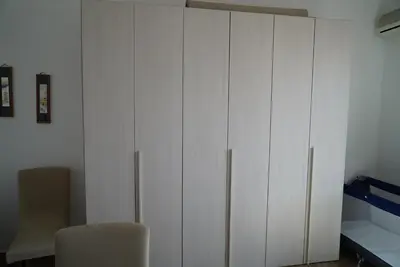 Letto o letti in una camera di La Magnolia
