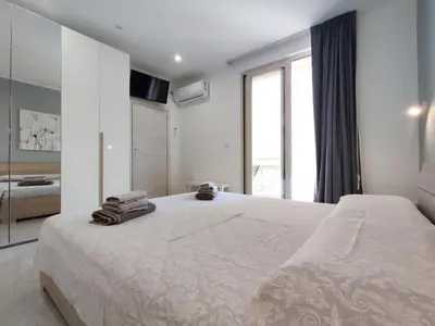 Letto o letti in una camera di La maison de Geneviève