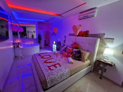 Letto o letti in una camera di Le Suite del Lungomare Catania