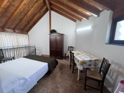 Letto o letti in una camera di Esclusivo Cortile Duca D'Aosta ai piedi dell'ETNA