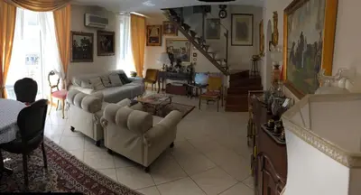 Area soggiorno di The Trip House - Between the center and the sea - Free WIFI and Jacuzzi
