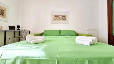 Letto o letti in una camera di Casa Iolanda