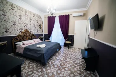 Letto o letti in una camera di Barocco al centro