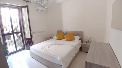 Letto o letti in una camera di Da Lina e Rosetta