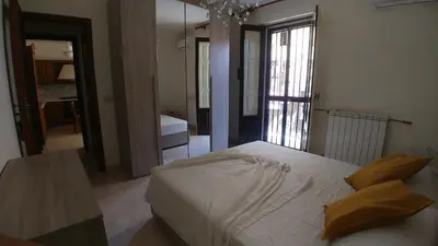 Letto o letti in una camera di Da Lina e Rosetta