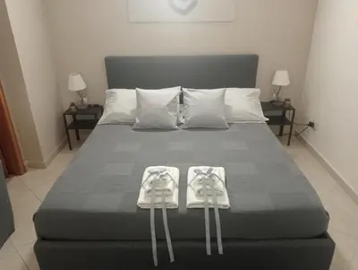 Letto o letti in una camera di ClemamHouse