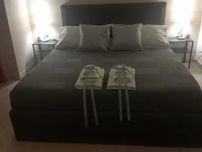 Letto o letti in una camera di ClemamHouse