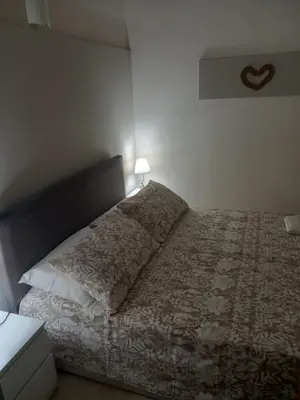 Letto o letti in una camera di ClemamHouse