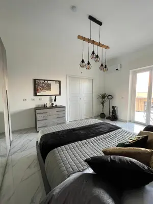 Letto o letti in una camera di BACARDI Lungomare - Modern apartment near the sea