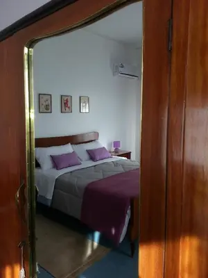 Letto o letti in una camera di Appartamento Raggio Di Sole