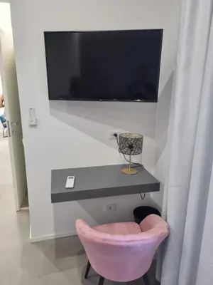 TV o dispositivi per l'intrattenimento presso Dadà Suites