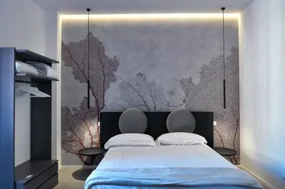Letto o letti in una camera di Dadà Suites