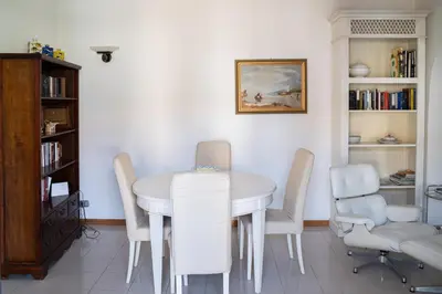 Area soggiorno di Elegant apartment in residence with seasonal pool