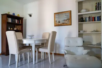 Area soggiorno di Elegant apartment in residence with seasonal pool