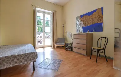 Letto o letti in una camera di 1 Bedroom Awesome Apartment In Acireale