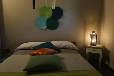 Letto o letti in una camera di Le Stanze dei Colori