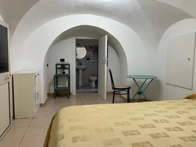 Letto o letti in una camera di Catania centro storico camere